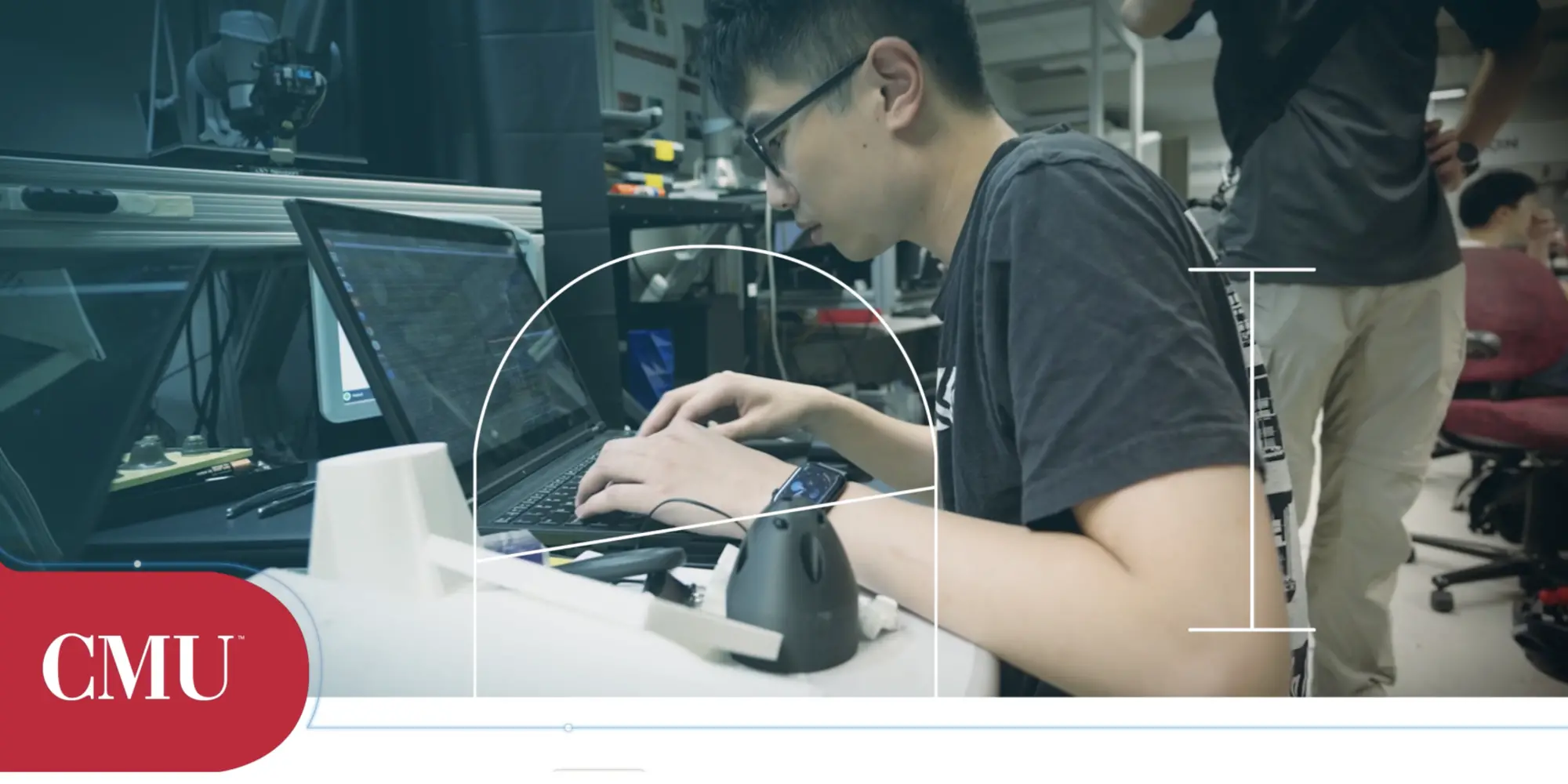 Student working at a computer in a lab